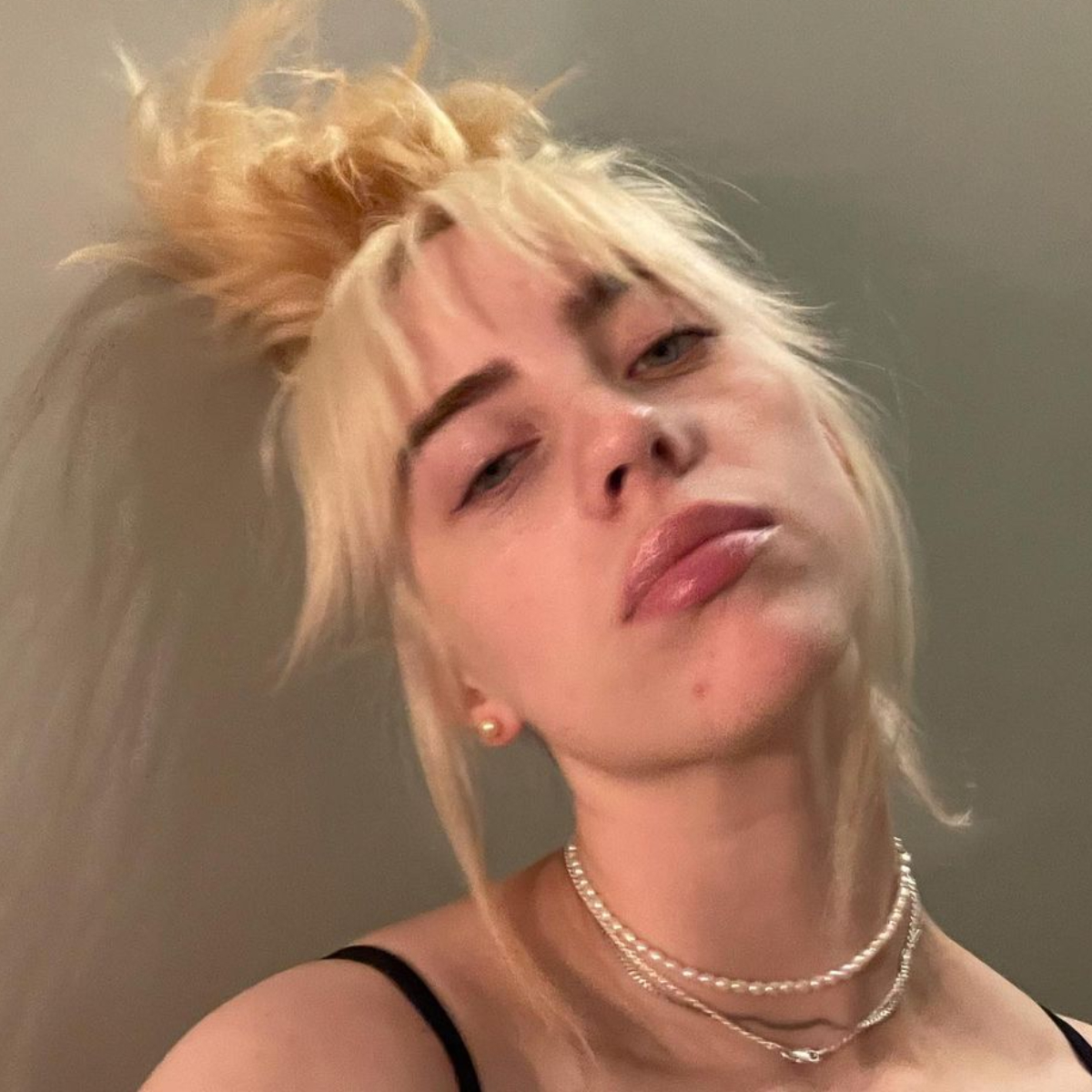 Billie Eilish reveals why kept her new look a secret